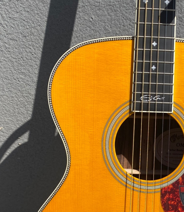 Yellow 6-string acoustic guitar with rosewood fingerboard. Fast shipping.