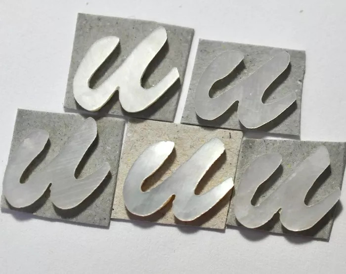 5 Letters of Lowercase U in White Mother of Pearl 11.7mm x 9.1mm x 1.5mm thick